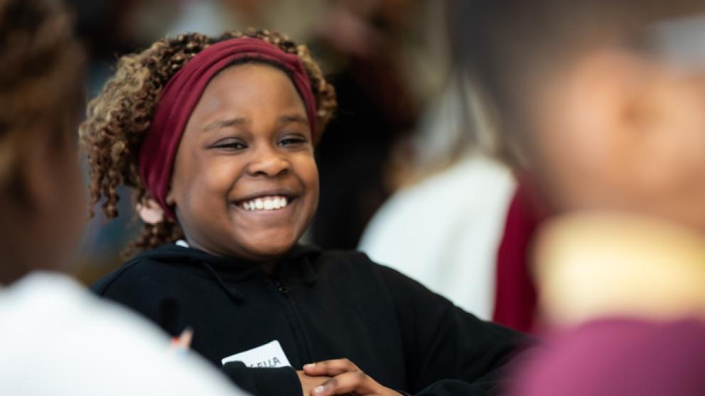 School child at an IntoUniversity launch event