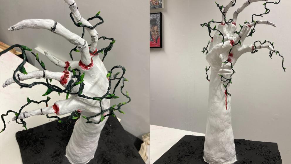 Image shows two image side by side of the sculpture which is a white hand with vines wrapped around the fingers 