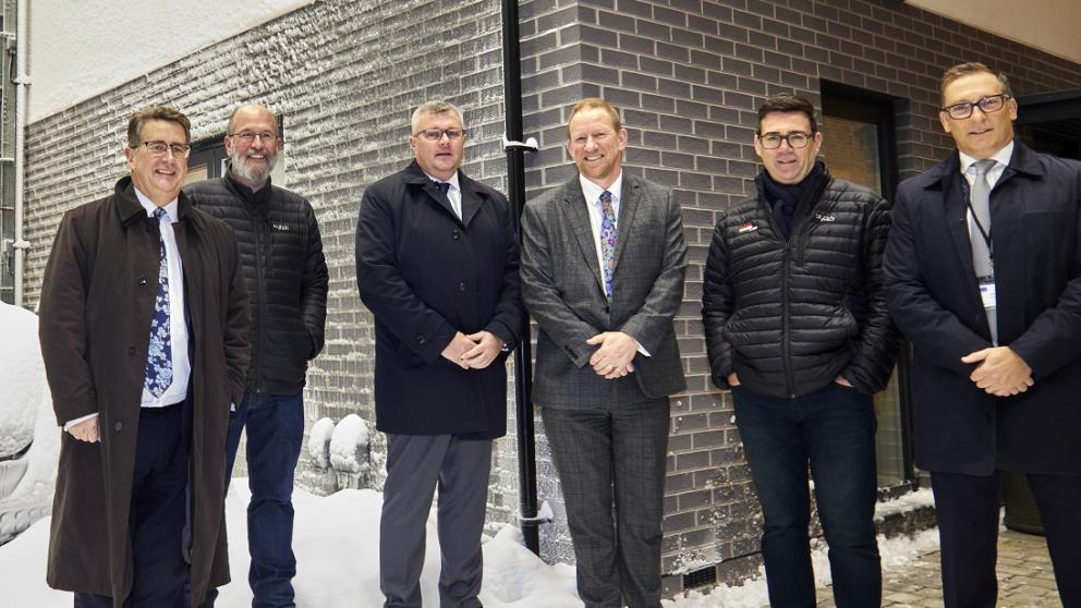 Six colleagues stood inside Energy House 2.0