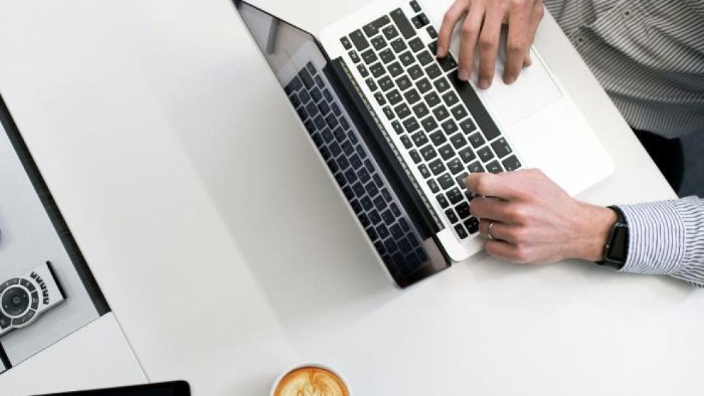 Person at laptop working