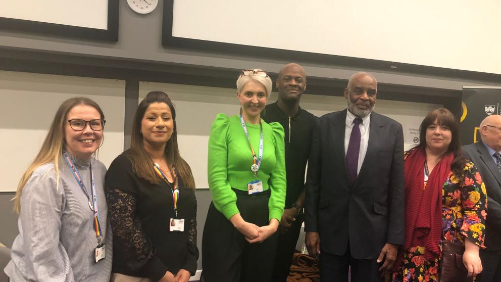 Group gathers for photograph at Dr Neville Lawrence event 