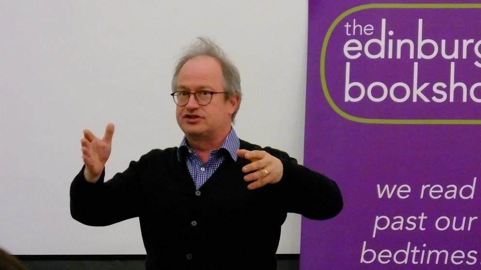 Robin Ince presenting a lecture