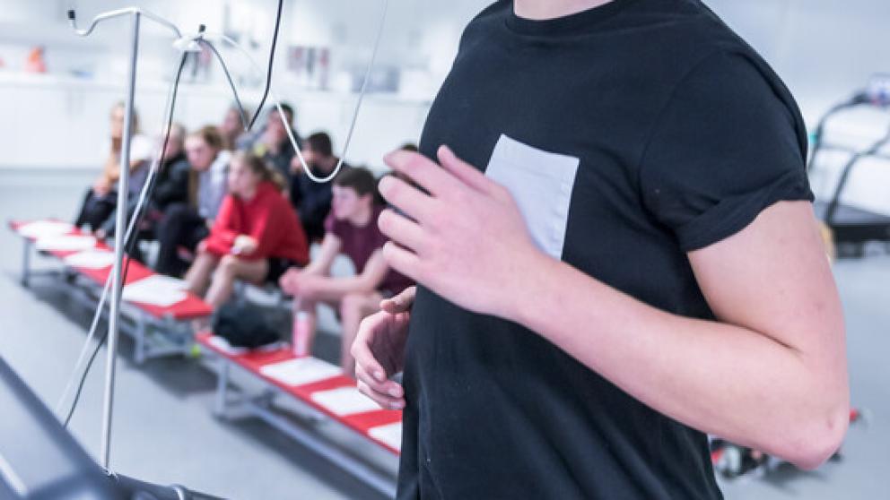 Student running on a treadmill in the human performance lab 