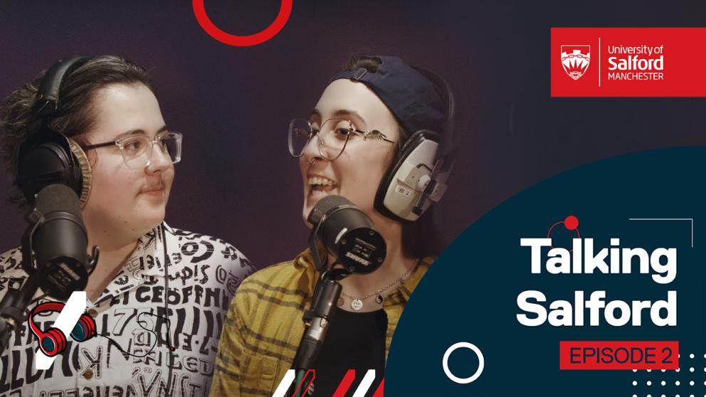 Two people sat in front of microphones with headphones on. Text: reads 'Talking Salford episode 2'