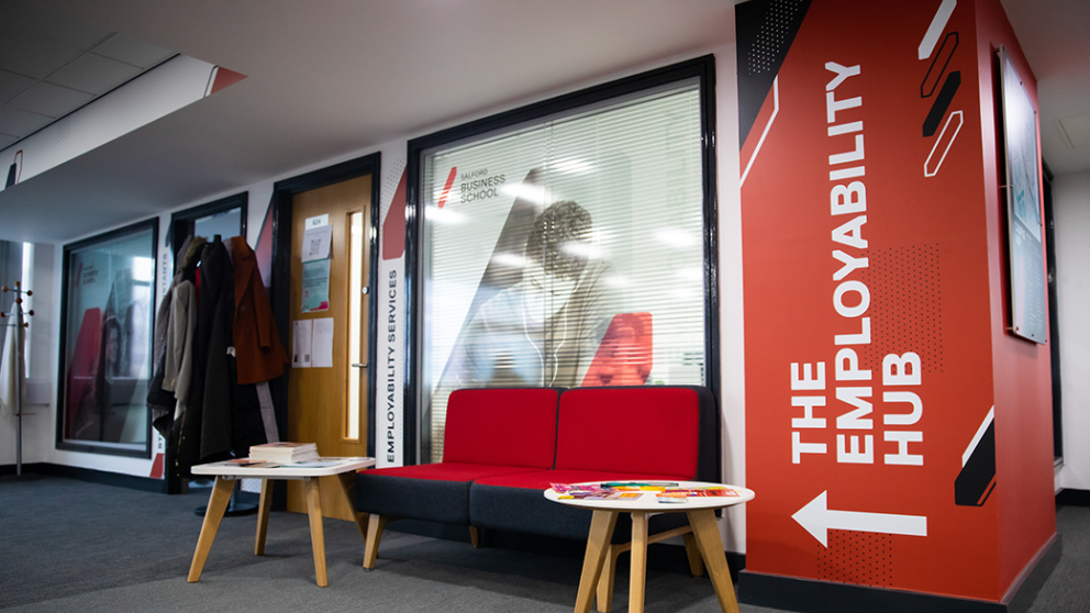 Wall and seating outside of the Salford Business School Employability Hub