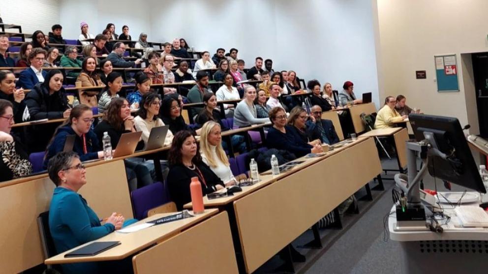Mr Justice Fordham addresses a full lecture hall