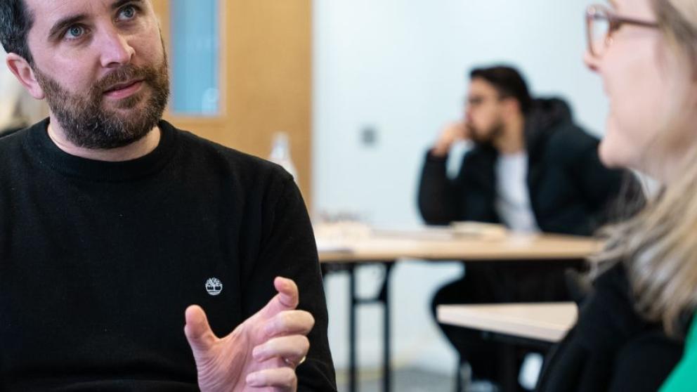 Man and woman in discussion 