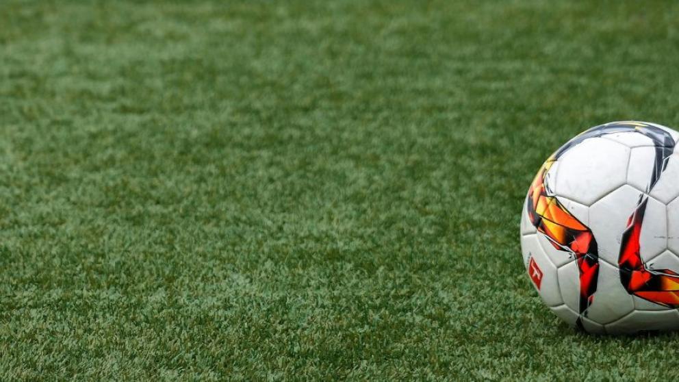 A football on artificial turf