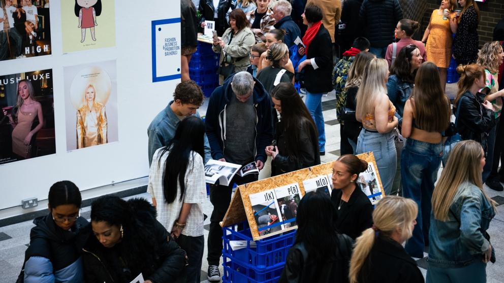 A crowd gathers in the New Adelphi atrium