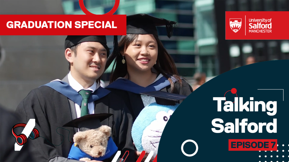 Two graduates pose for a picture at Graduation at Salford