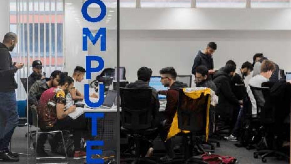 Students in a computer suite in the library