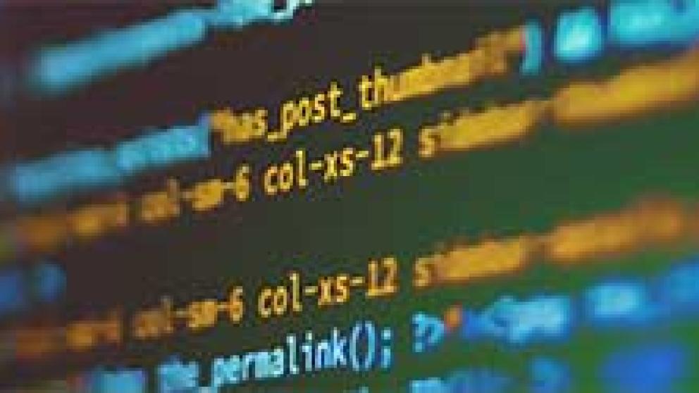 Computer code script on a monitor screen