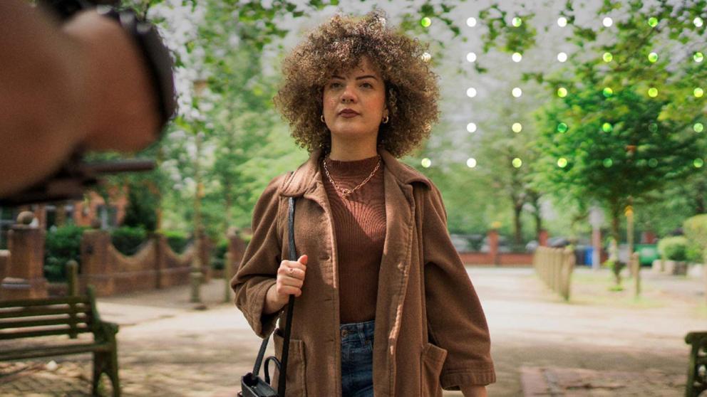 Celeste walking through Salford