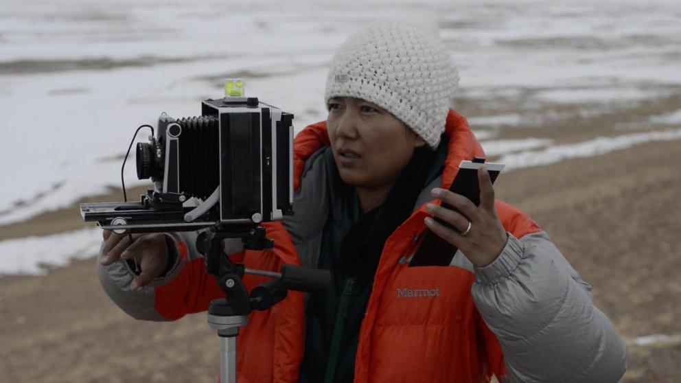 Dr Yan Wang Preston operating a camera 