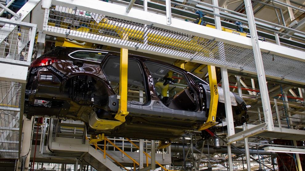 The partly-assembled chassis of a Vauxhall Astra suspended on the production line of the Vauxhall factory at Ellesmere Port Cheshire