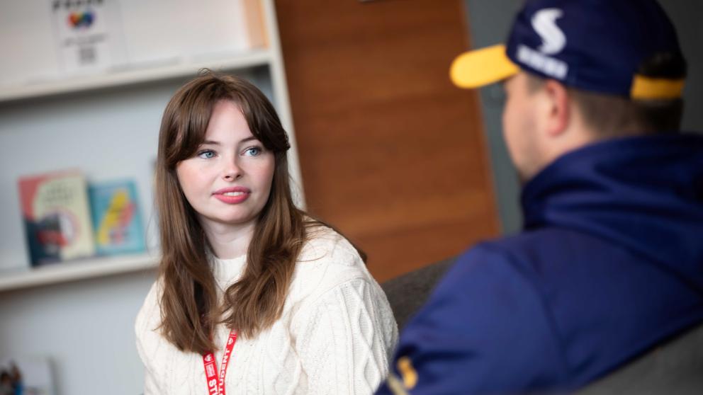 Two students in conversation