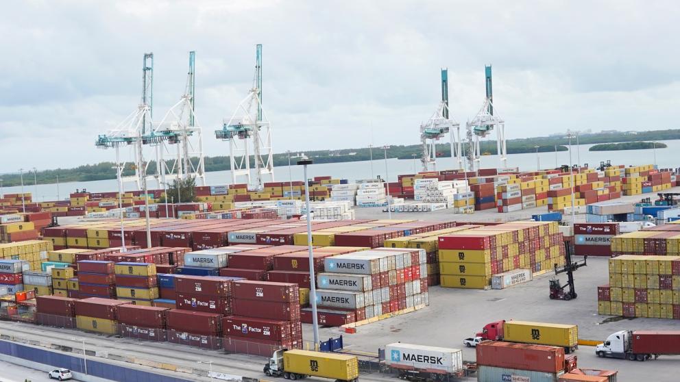 Cargo shipyard with multiple containers and cranes