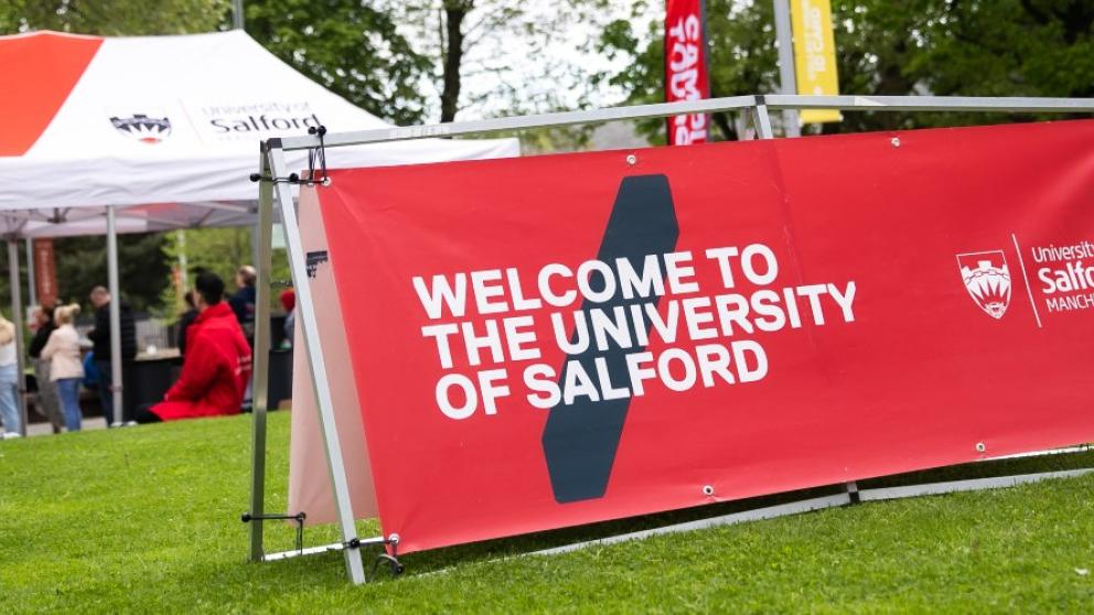 Welcome to the University of Salford signage on campus