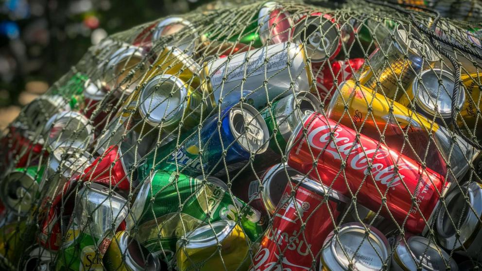 netted bag full of rubbish cans