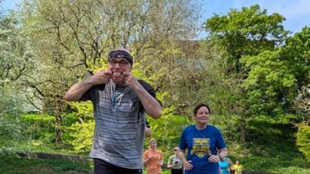 Sustainability Team member Nigel Blandford pulling a silly face whilst running.