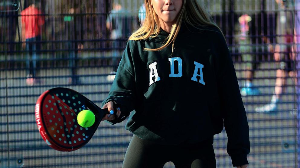 Young woman playing Padel 