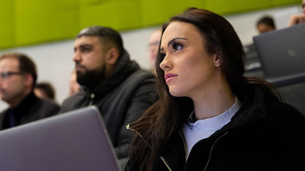 Students concentrating at a lecture