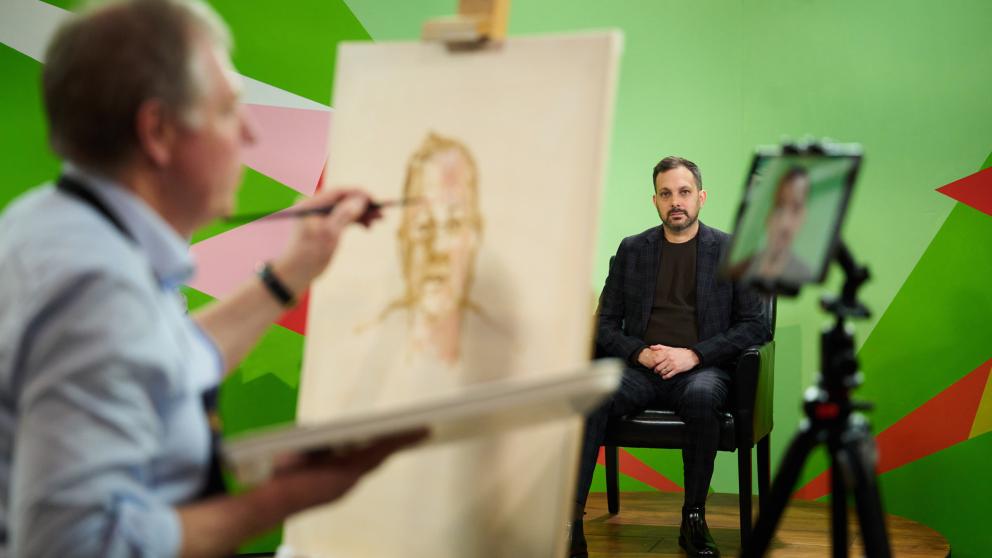 An artist does a portrait painting