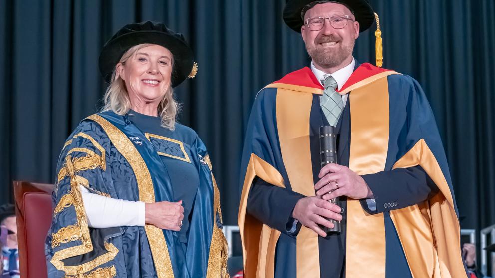 Chancellor Lucy Meacock and Honorary Fellow Mark Airey are pictured together at the University's graduation ceremony