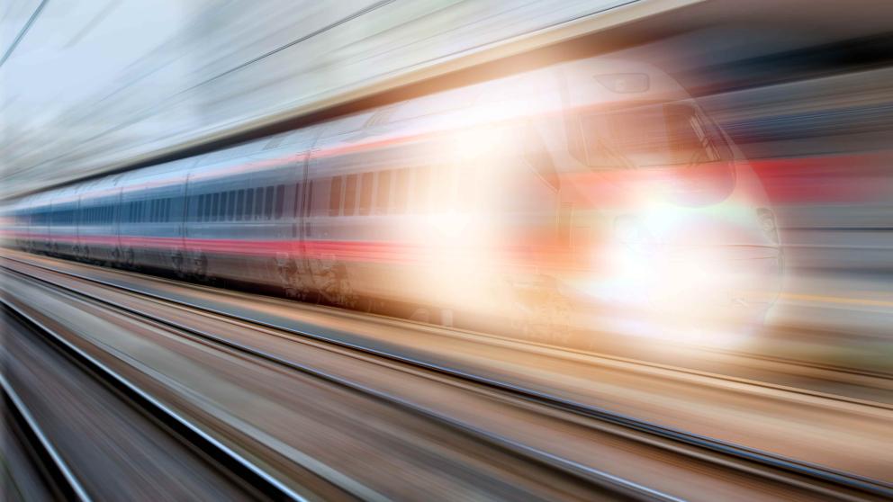 Blurred image speeding train 