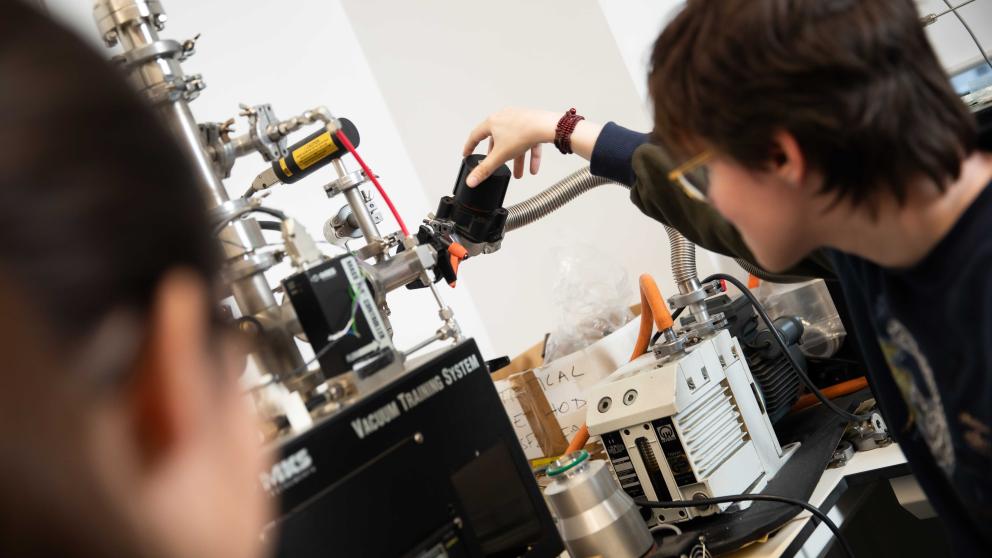 Physics student in the lab