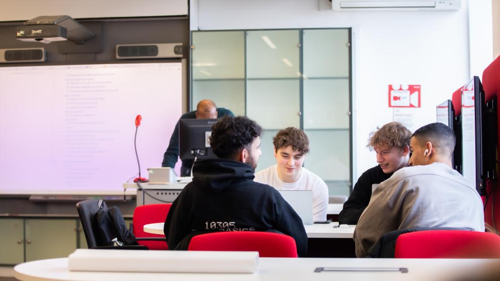 group of students doing group work in a business seminar