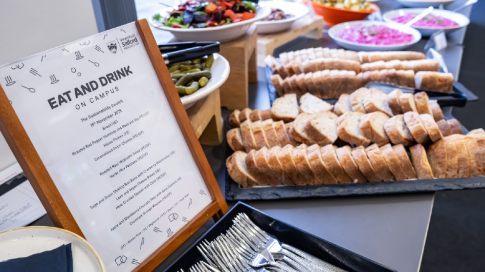 A photograph of buffet food with a written menu