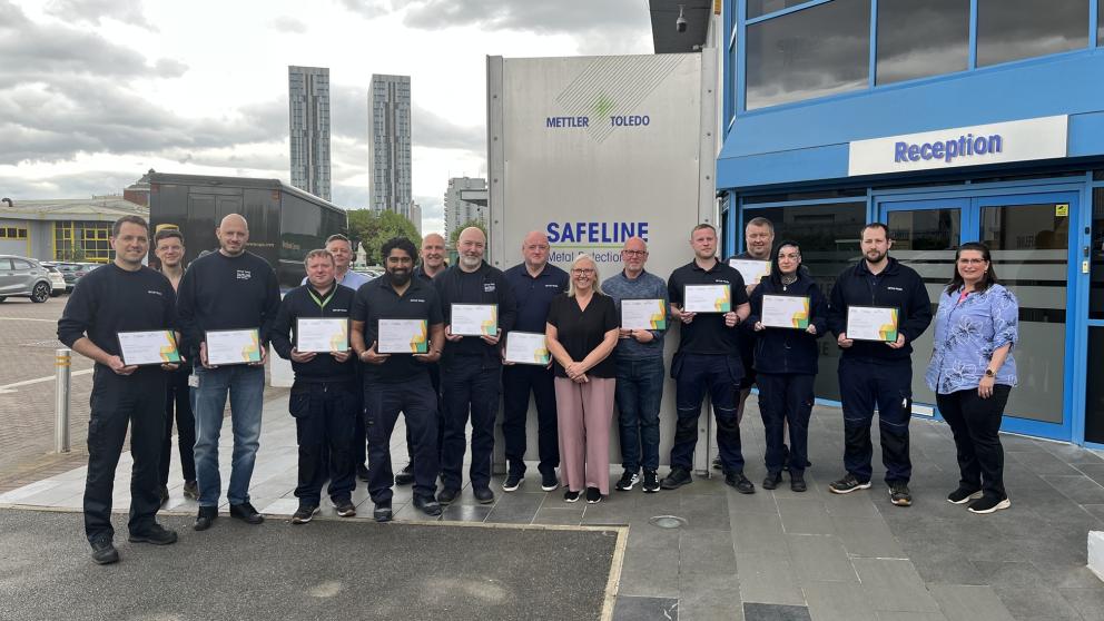 Dr Ann Mulhaney with Mettler-Toledo Safeline Ltd team