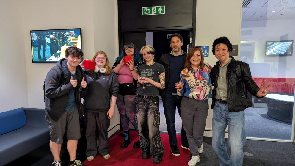 Group of creative digital media and gaming students standing together