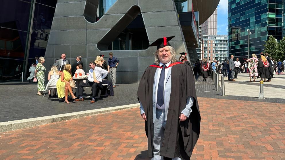 A man in graduation attire