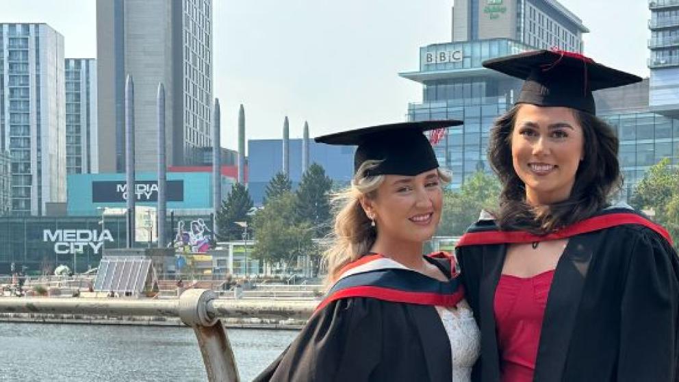 Two women at MediaCity for graduation