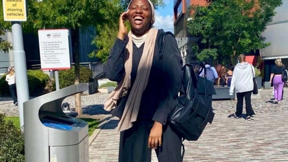 International student Zahra smiling on campus