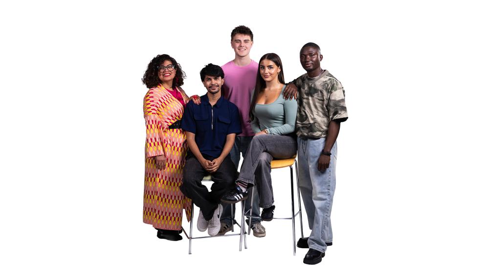 Five diverse students pose together for a portrait, smiling and conveying a sense of inclusion, community, and belonging