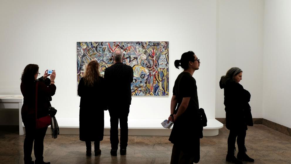 People are looking around an art gallery