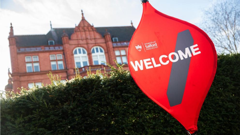 A welcome sign on Campus