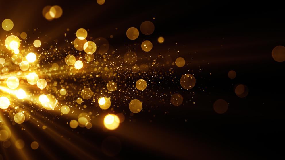 Decorative image of gold sparkles