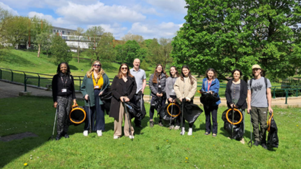 Group of litter pickers on Peel Park Campus, University of Salford