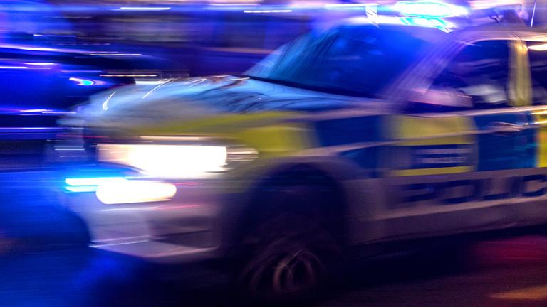 Police car motion blur at night