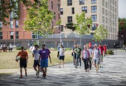 Potential students exploring the University of Salford campus.