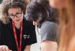 University of Salford staff discussing an open day schedule