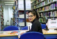 A student studies in the Library