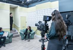 Students filming and acting in a studio