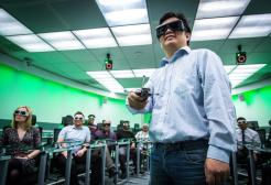 Group of people attending a THINKlab 3D presentation, University of Salford