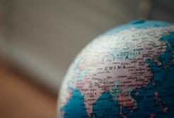 Close up of desktop globe showing China and India