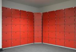 A wall of red lockers on the ground floor of the Clifford Whitworth Library